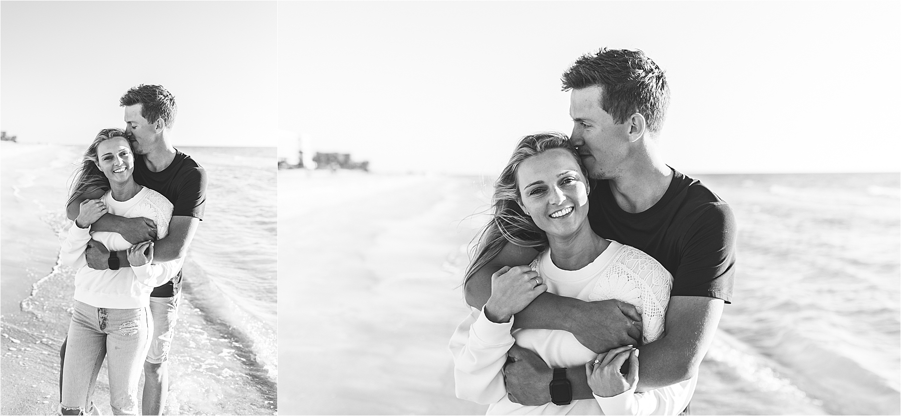 Black and white kissing photo at the beach 