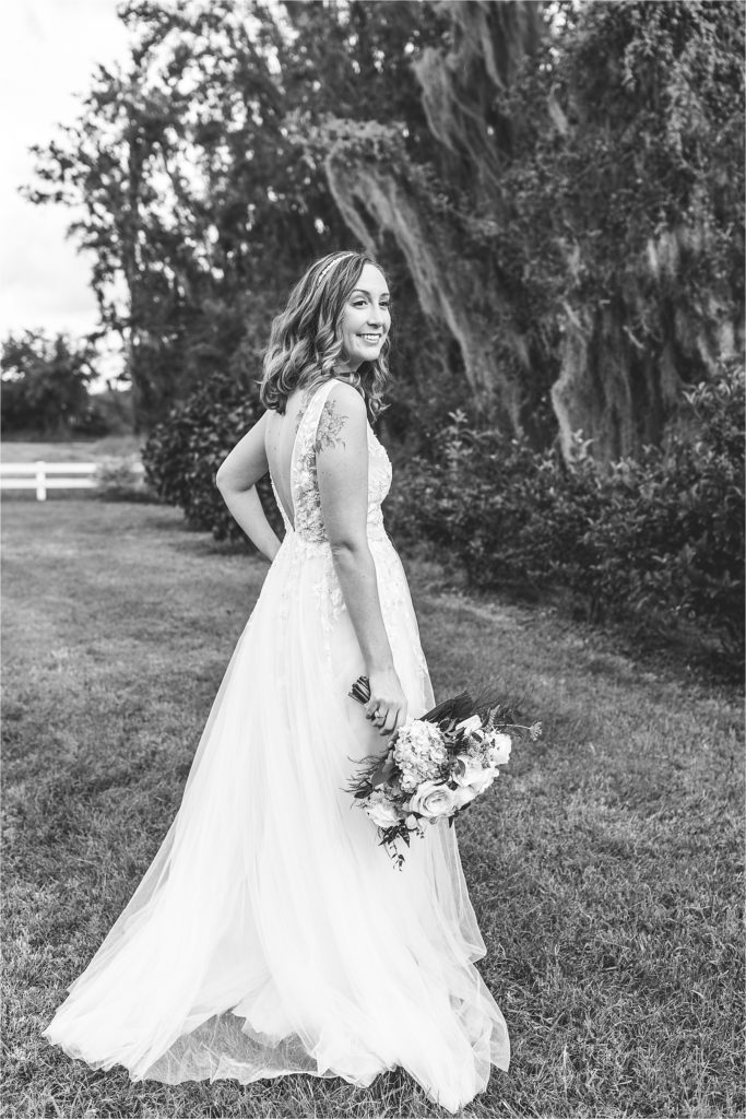 black and white photo of bride in wedding dress