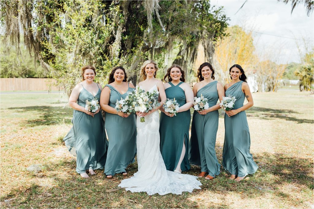 Bride and Bridesmaids outside at Lone Oak Acres