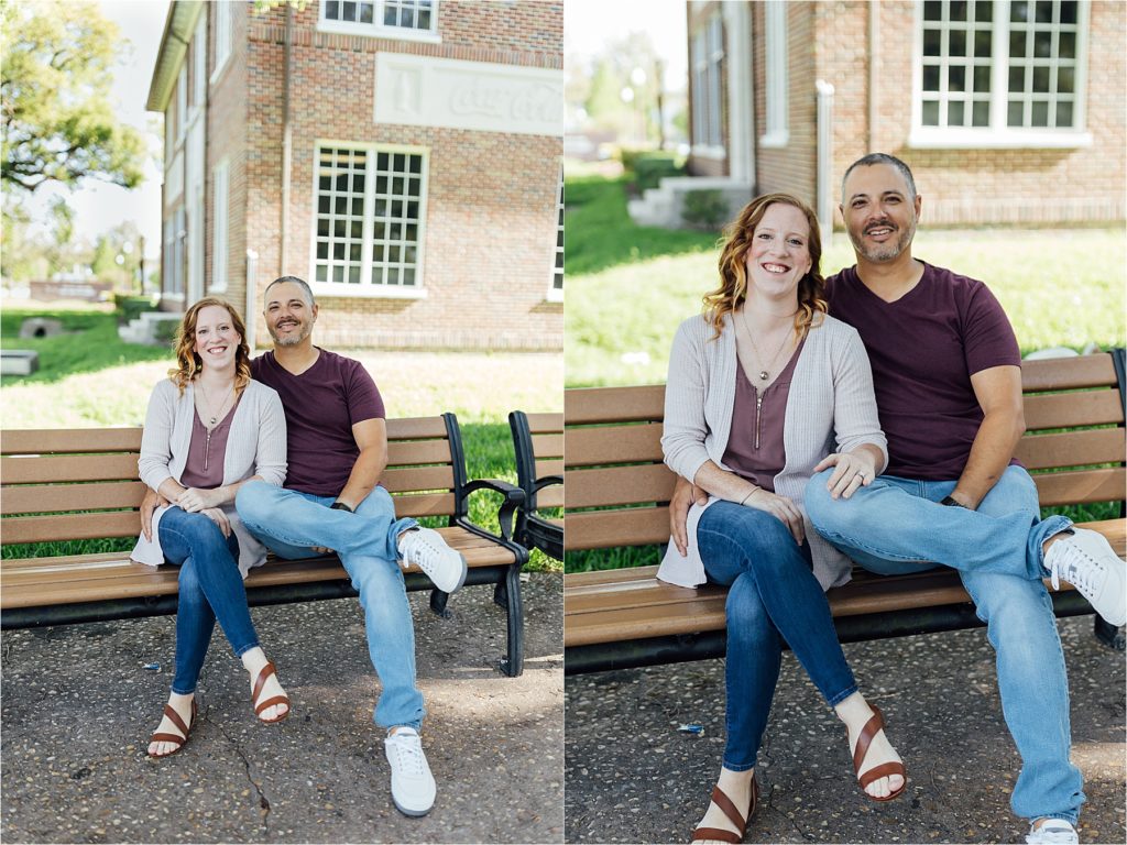 smiling couple sitting on bench